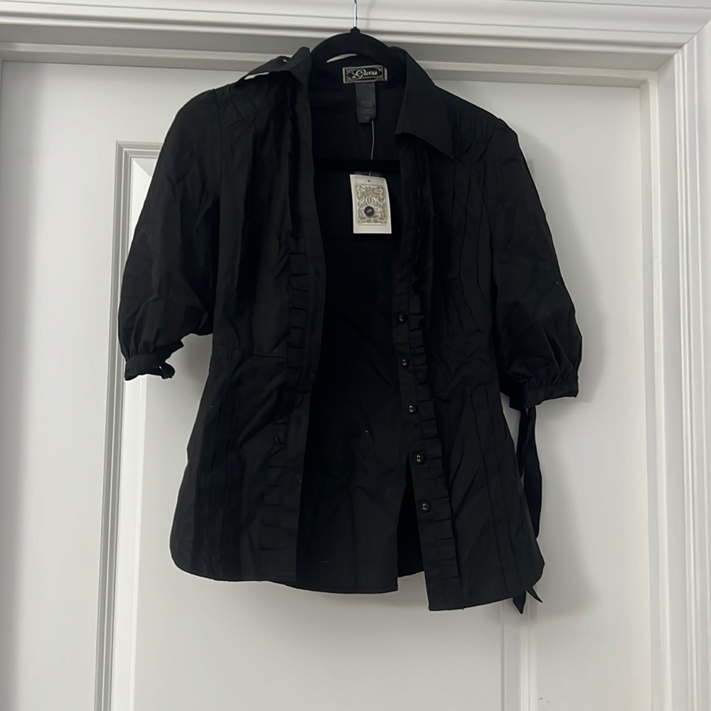 Guess button up top
